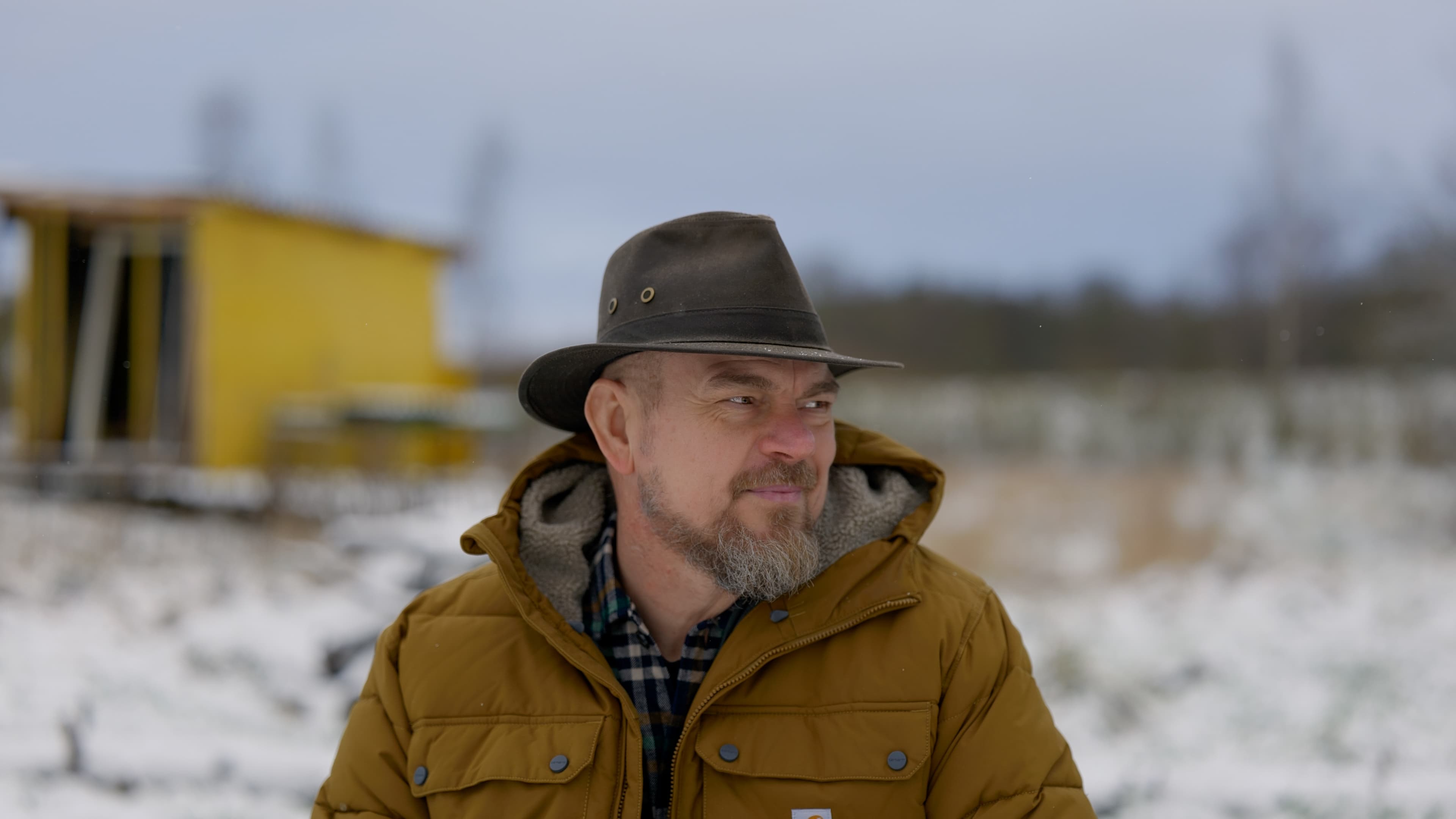 Jesper β outdoor portrait with hat, winter landscape